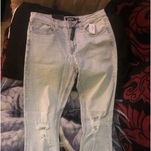 Light blue skinny ripped jeans 31w 30L RSQ brand